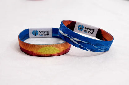 Reversible bracelet. Peace Be Still NFC elastic wristband showing a calming sunset design on one side and the other has a blue stormy ocean pattern inspired by Mark 4:39.