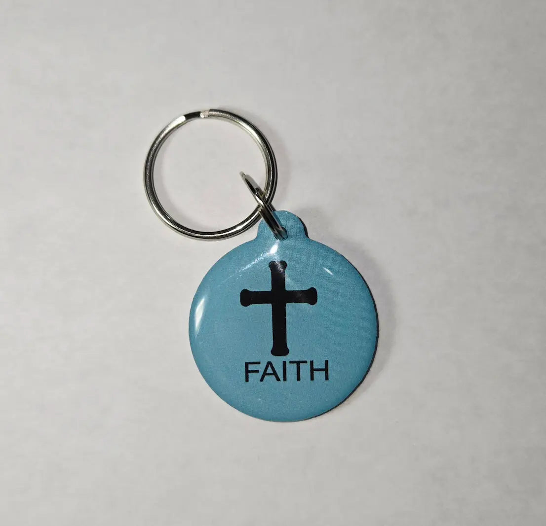 Teal NFC keychain with black cross and "FAITH" black text.